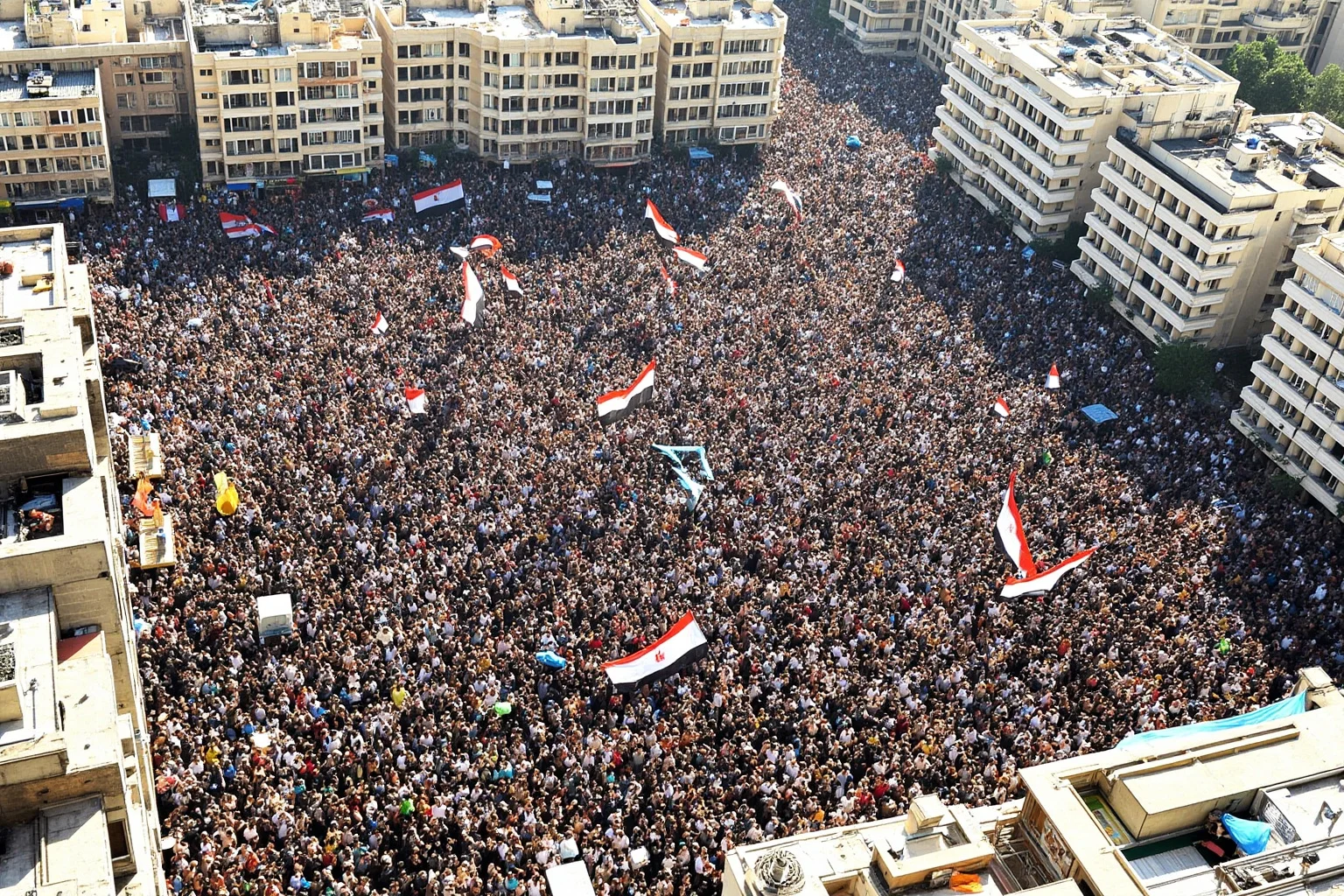 21 Times Governments Were Overthrown by the People 18 Tahrir Square filled with Egyptian protesters, 2011, massive crowd, tents and flags, aerial perspective illustration.