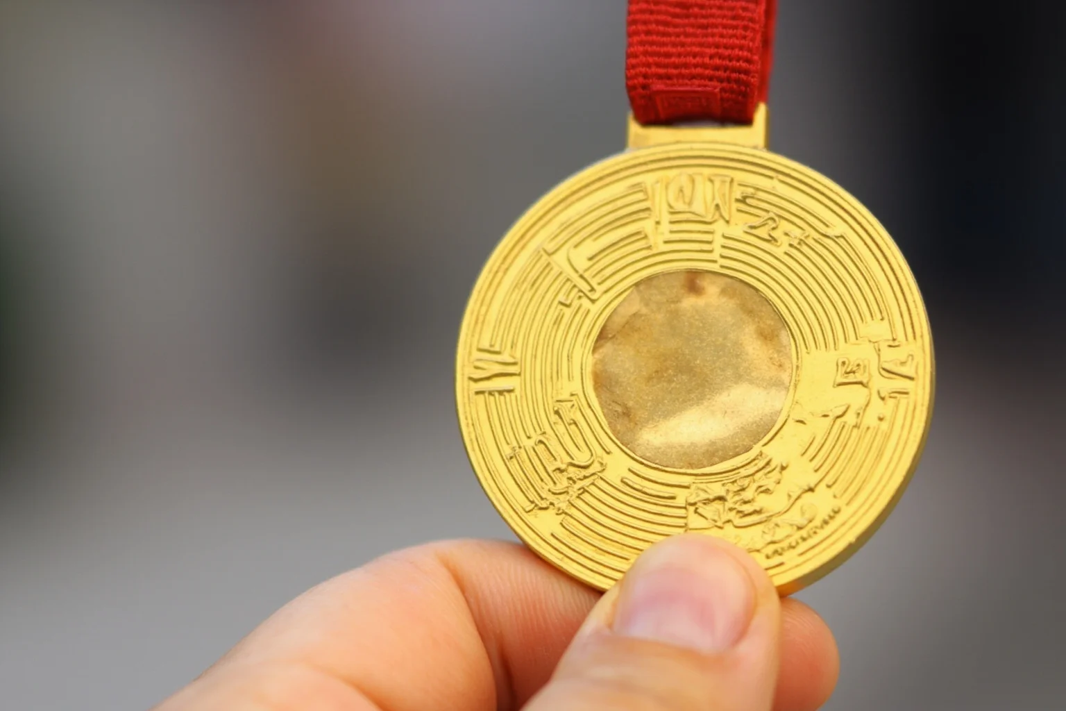 The Weird History of Olympic Medal Designs 17 The 2024 Paris Olympic medal with a hexagonal piece of Eiffel Tower iron in the center.