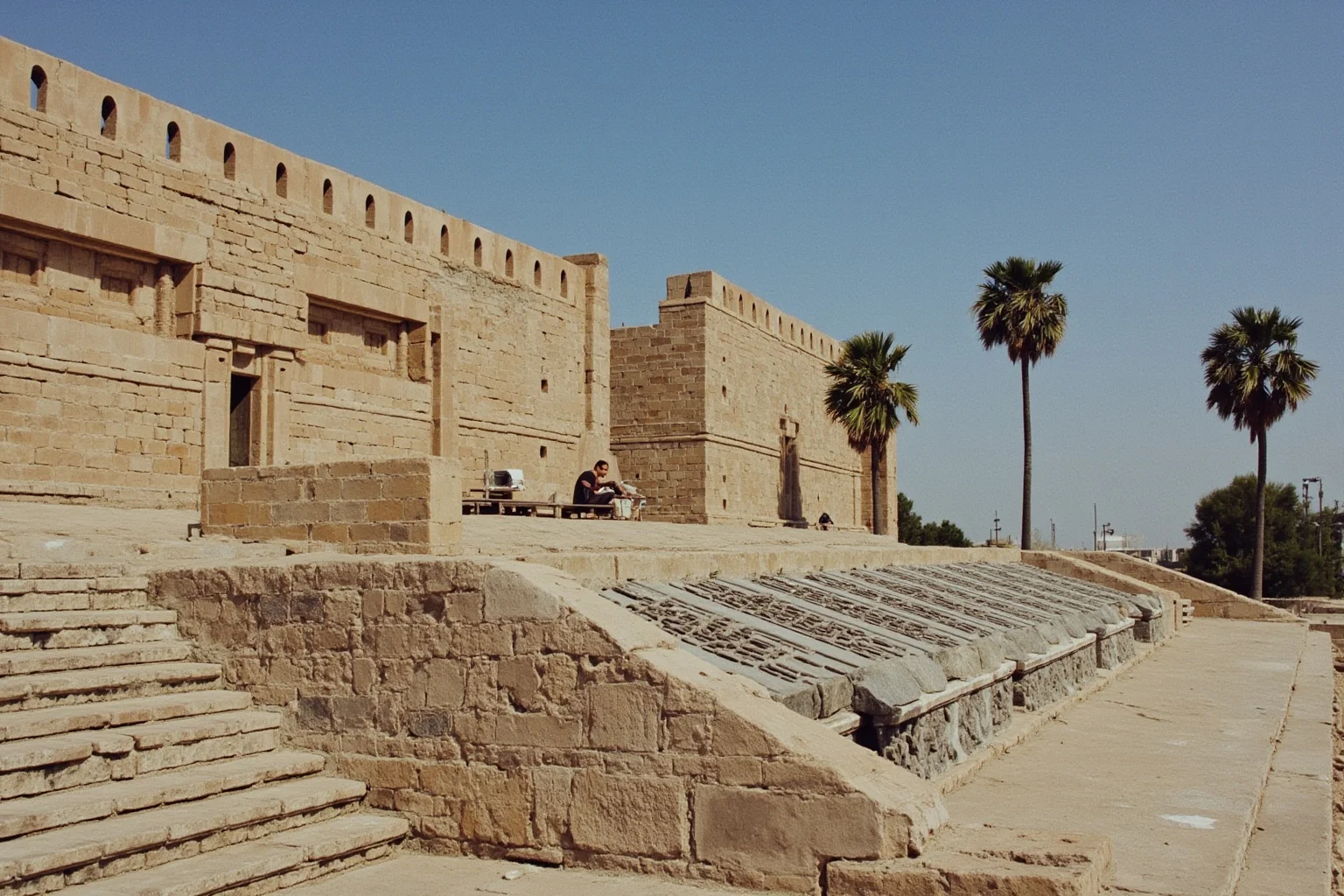 The Fertile Crescent: 20 Ancient Civilizations That Started Society As We Know It 4 The city of Babylon with the Code of Hammurabi stele in the foreground, Babylonian architecture and palm trees.